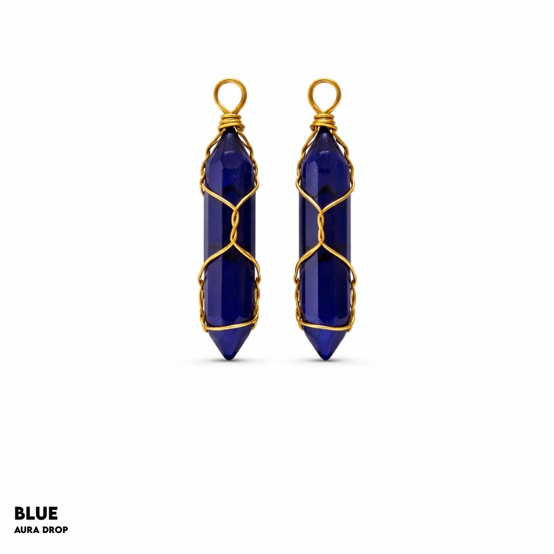 Pair of blue stone earrings with gold wire wrapping on a white background