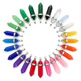 Colorful crystal pendant necklace set on a white background